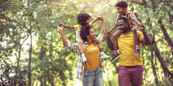 A family getting outside to get the kids a break from screen time.